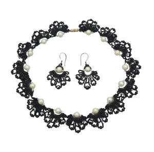 Handmade black beaded necklace and earrings set.